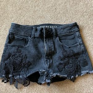 AE black jean shorts with lace detailing